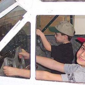 Kids playing in airplane exhibit - Bushplane Museum